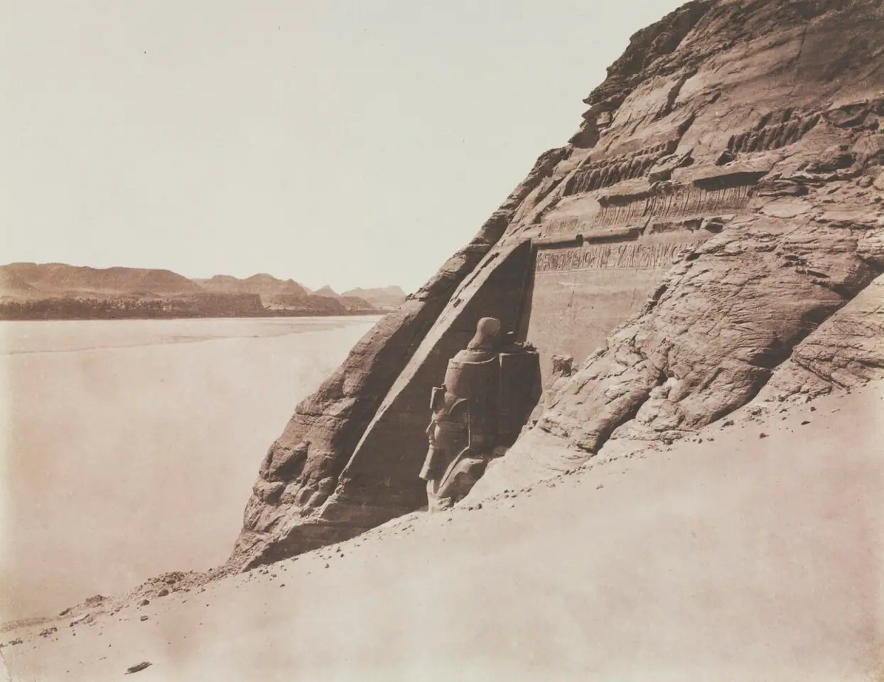 The Great Temple half-buried in sand, photographed by Félix Teynard in 1851.