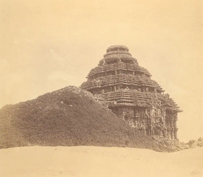 The hall from the south-west, photographed around 1890, with debris piled against it.