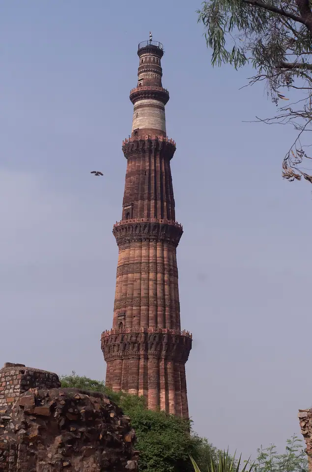 The Qutub Minar's fluted shaft and balconies.